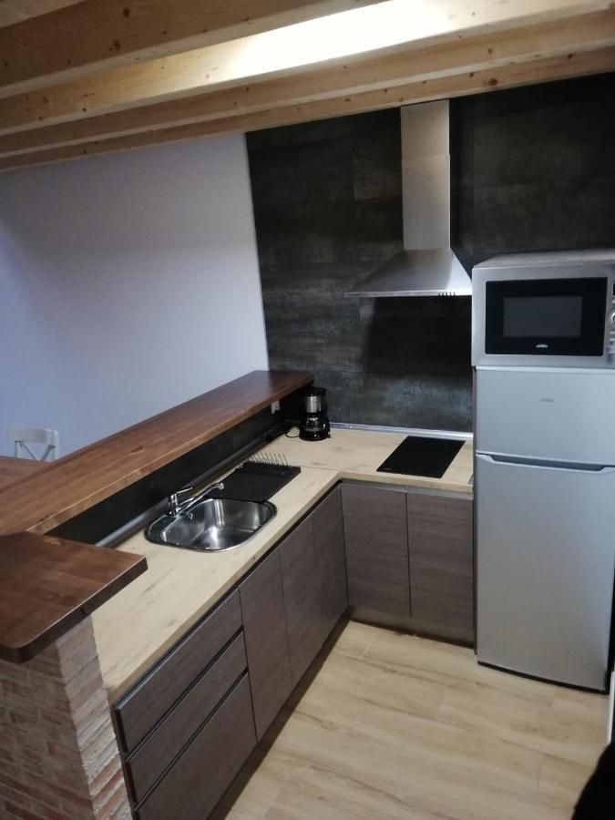 Puente Viejo De Buitrago Casa Enebro Apartment บุยตราโก เดล โลโซยา ภายนอก รูปภาพ